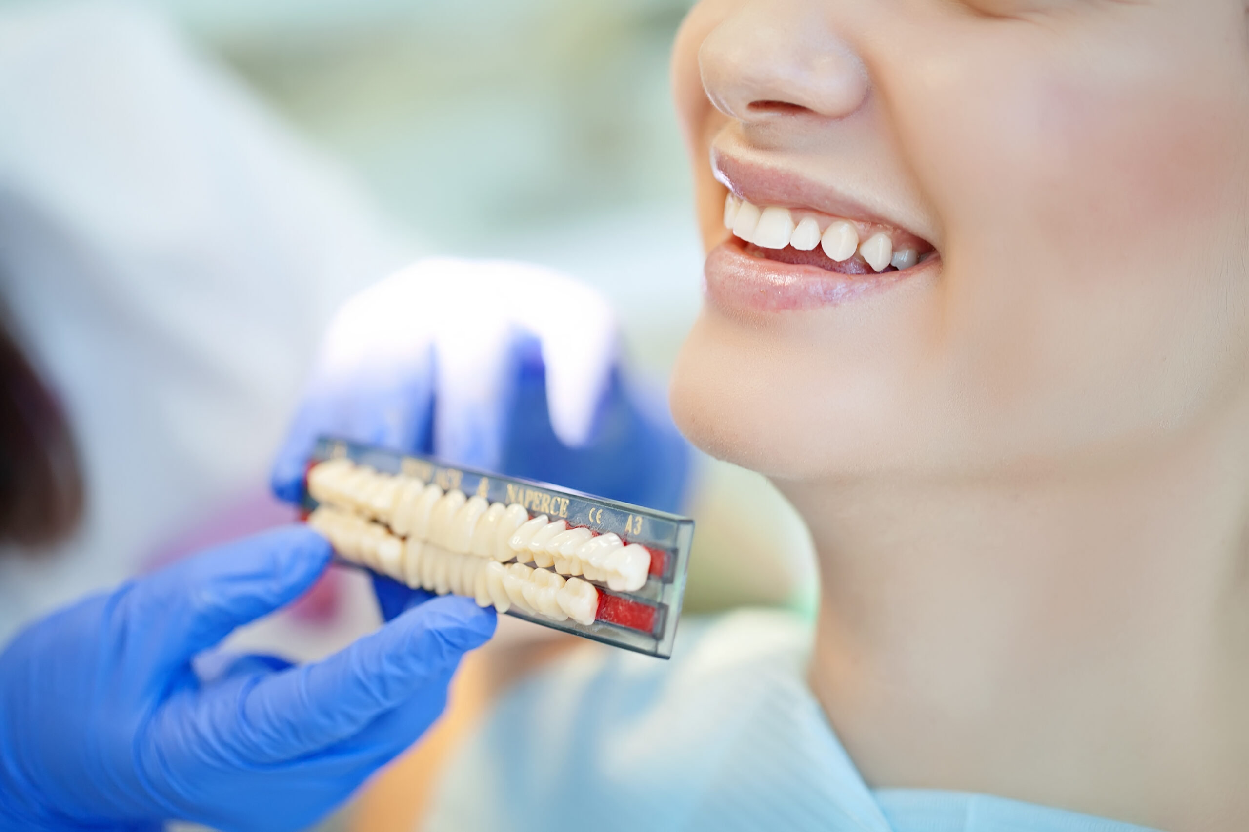 Woman at the dentist receiving consultation about dental bridges
